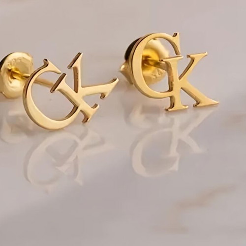 CK earrings gold plated new