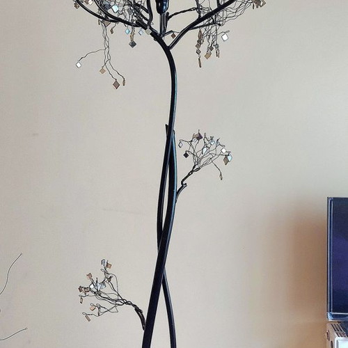 Metal floor candle holder with flexible branches, gothic style