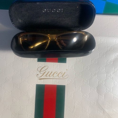 Gucci sunglasses like new, gold-colored acetate frame with case and bag