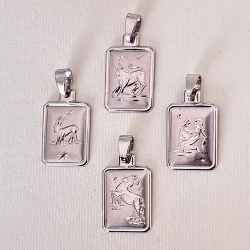 Zodiac white gold k14 pendant like new, platinum plated