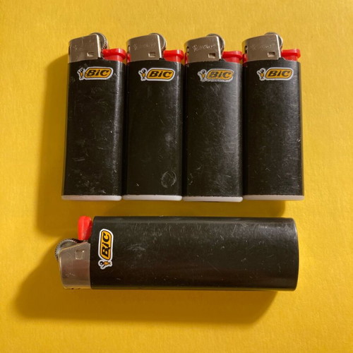 Bic 5 black lighters like new