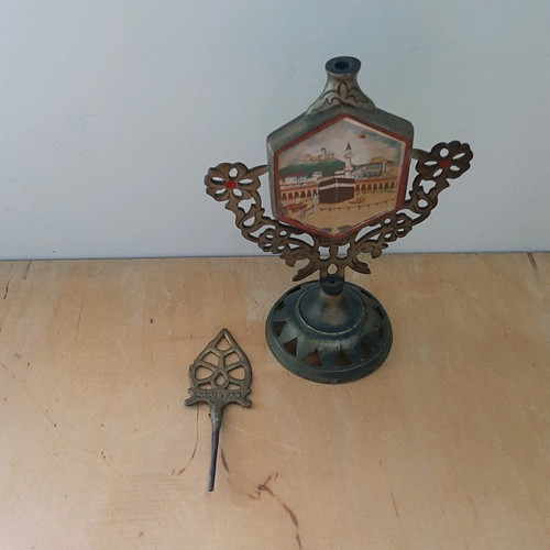 Bronze perfume holder with rotating mirror used