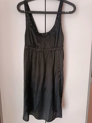 Black mini dress used with small gold studs
