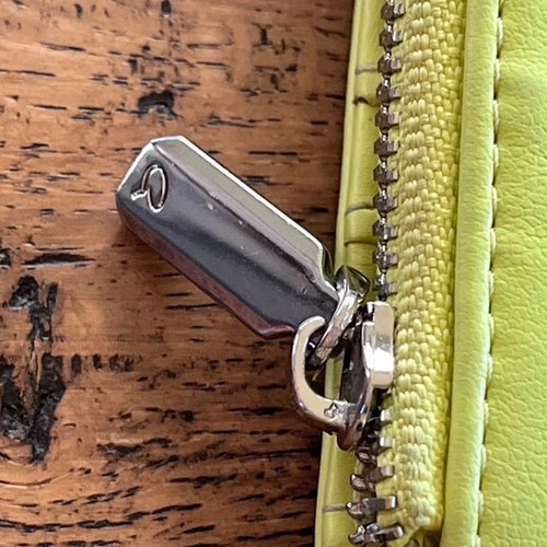 Axel wallet used in bright lime color