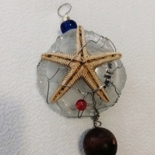 Art micro sculpture used with glass, wood, beads, starfish