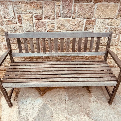 Outdoor bench used, made of solid teak wood