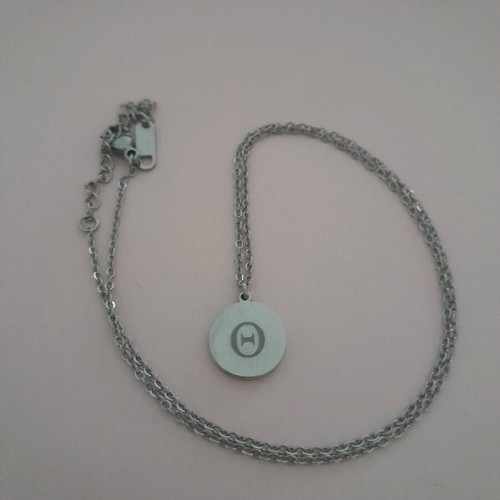 Necklace new with letter Theta