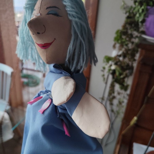 Handmade doll for collectors or puppet theatre on wooden base