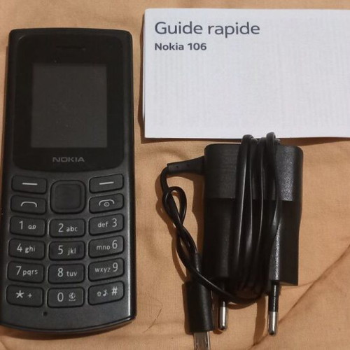 Nokia 106 dual sim used for parts with charger and box