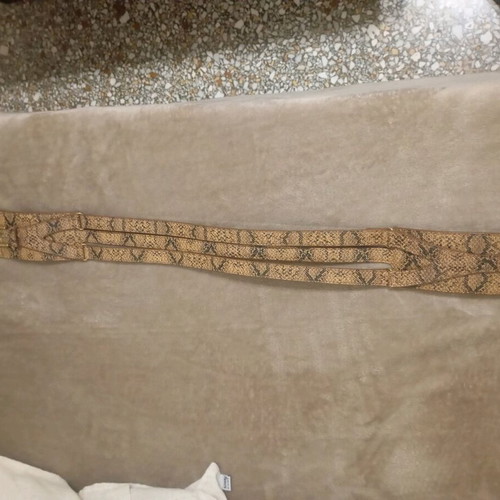 Belt like new, adjustable, black and beige