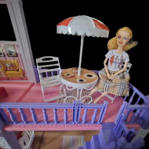 Dollhouse with furniture and doll like new