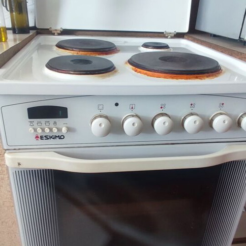 Eskimo electric stove used with electronic timer and illuminated switches