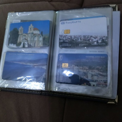 Collectible phone cards used with album
