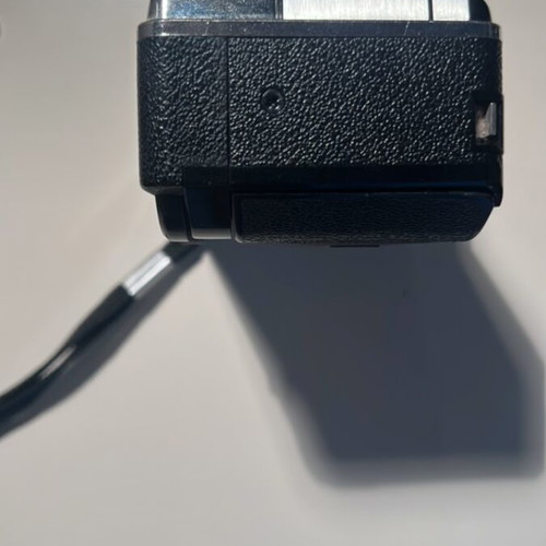 Kodak Instamatic 177X camera used, with Kodar lens and strap