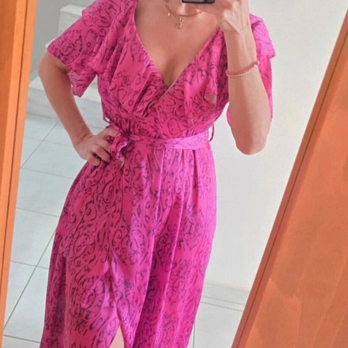 Wrap dress in bright fuchsia with ruffle sleeves