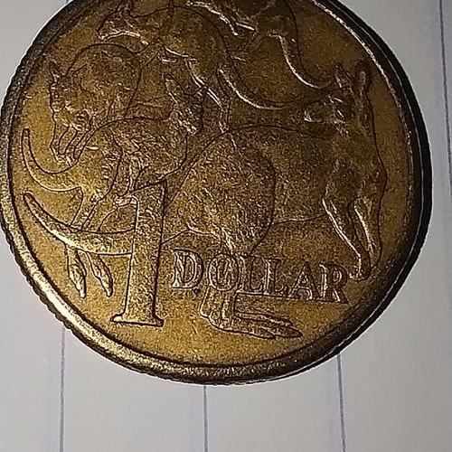 Australian coins used, pack of 4 one dollar pieces