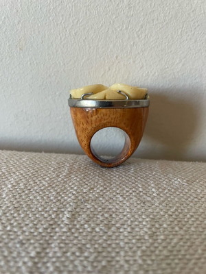 Statement ring handmade from Italy with wood and carved bone flower