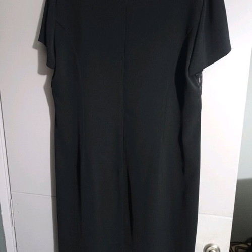 Women's black dress with short sleeves and copper details size 54 like new