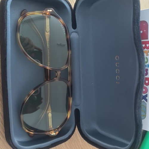 Gucci women's sunglasses, gold color