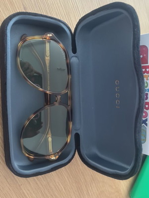 Gucci women's sunglasses, gold color