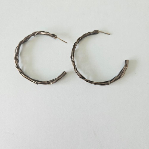 Woven hoop earrings used, bronze by Anna Maria Mazaraki