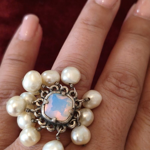 Dyrberg/Kern statement ring used with pearls and iridescent stone