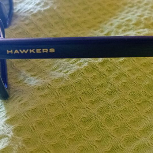 Hawkers women's sunglasses used, black with lens wear