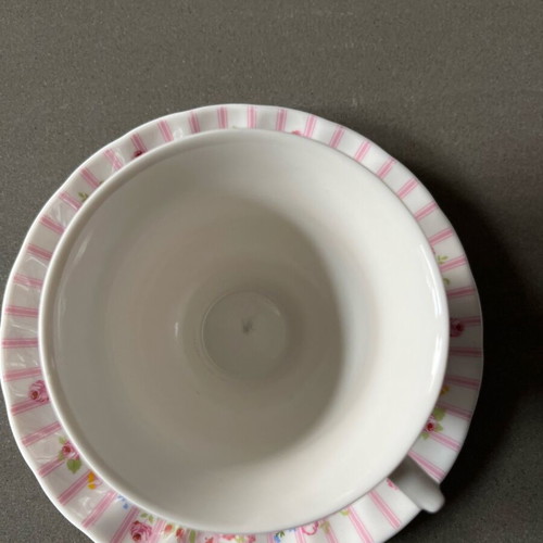 Porcelain cup with saucer used