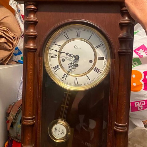 Wooden wall clock with pendulum like new, classic design