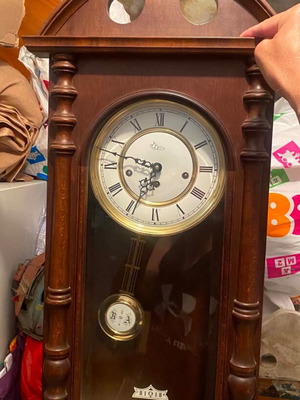 Wooden wall clock with pendulum like new, classic design