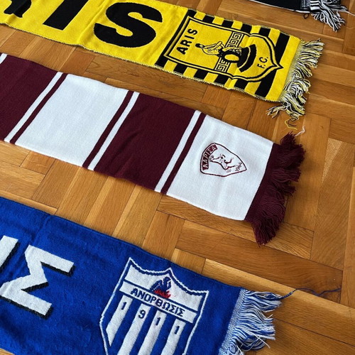 Collection of used football scarves, beanie and shirt set
