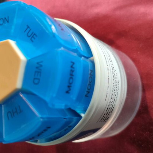 Rotating plastic weekly pill organizer new medication storage device