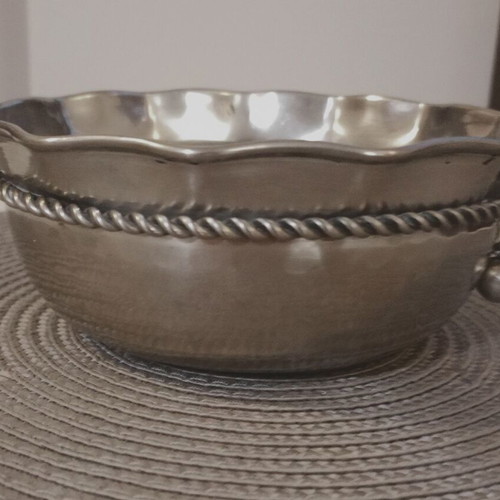 Metal decorative item used with perimeter detail