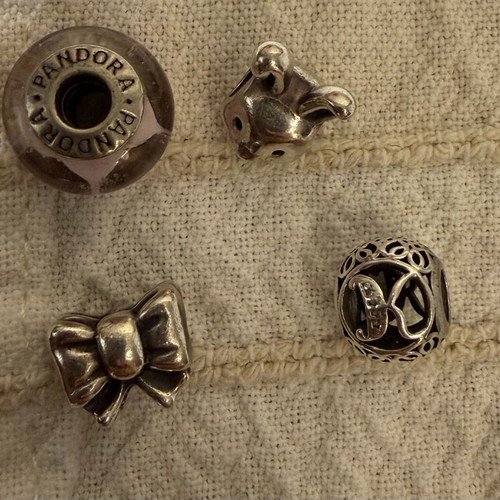 Pandora charms symbols like new, pink and silver
