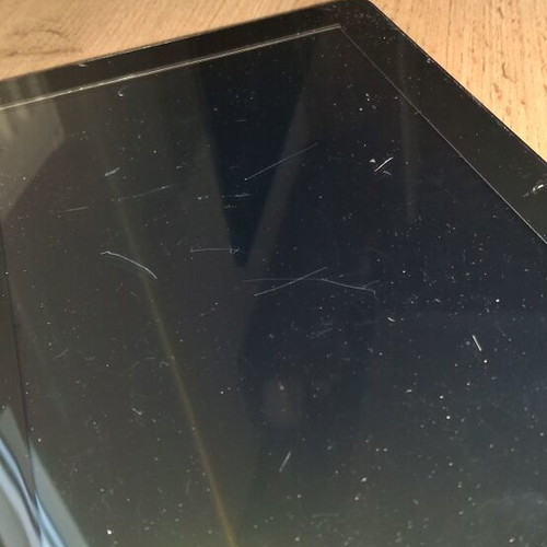 E Star tablet used, for parts or use, with charging cable