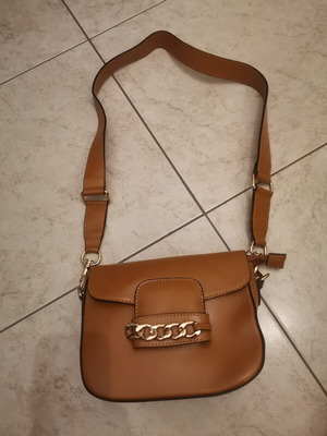 Tan leather crossbody bag with gold details