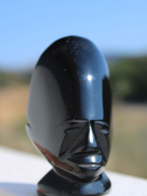 Obsidian African face sculpture