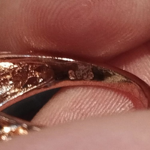 Elegance rose gold ring with white and blue stones
