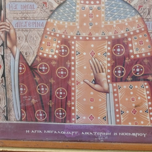 Vintage icon of Saint Catherine in frame with glass, used