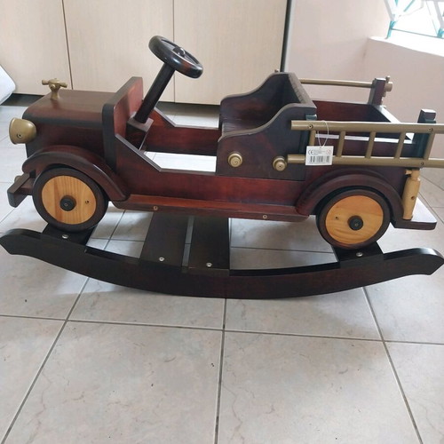 Rocking wooden car made of beech and pine