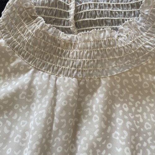 Romantic women's blouse beige used, size M with smocked waist and peplum hem