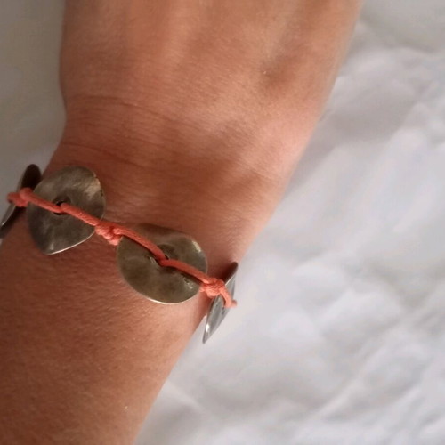 Handmade bracelet with orange cord
