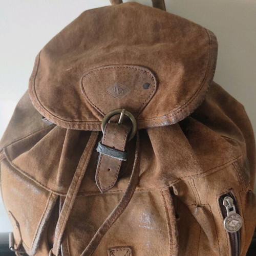 Handmade leather backpack used with adjustable straps