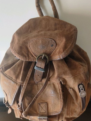 Handmade leather backpack used with adjustable straps