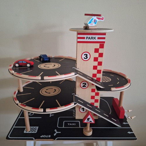Hape wooden three-level car garage with elevator and vehicles