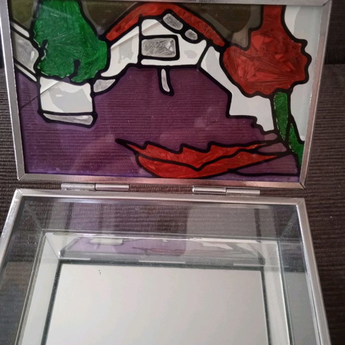 Stained glass jewelry box used with embossed colors and mirror base