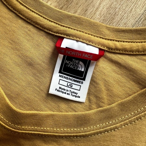 The North Face T-shirt like new, size L, beige gold