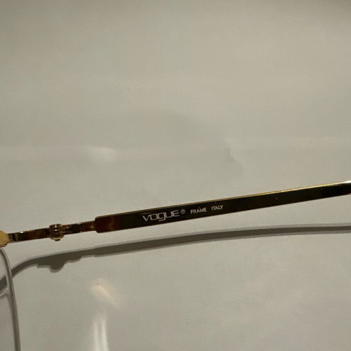 Oval Vogue optical glasses with tortoise details and gold frame, new