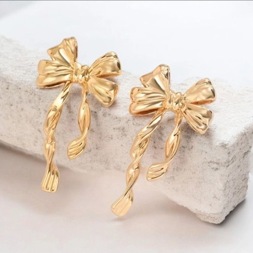 Earrings with bows new, gold color, hypoallergenic