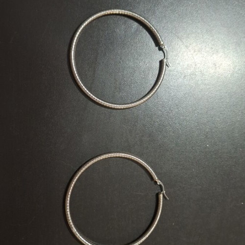Earrings made of steel like new